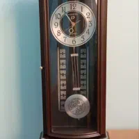 ساعت دیواری آونگ دار