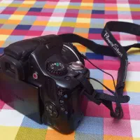 دوربین Canon SX30 IS به همران کیف و پایه دوربین