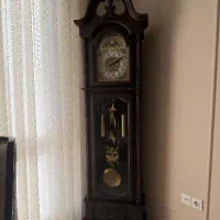 ساعت ایستاده و کنسول و آینه