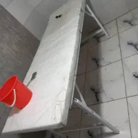 تخت تزریق و سطل زباله و...