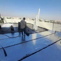 پخش و نصب ایزوگام قیرگونی لکه‌گیری آسفالت شرق مشهد