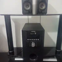 اسپیکر بابلندگوی کوچیک درحدنونو.میزکامپیوتر بزرگ