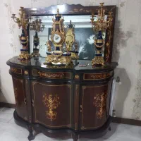 میز کنسول و آینه به همراه ساعت و دو شمعدان