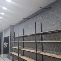 قفسه و دزدگیر لباس فروشی