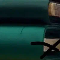 پارچه ساتن مرلین سبز یاقوتی یا همان یشمی