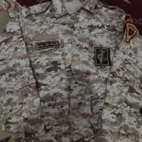 لباس نظامی خاکی|لباس|تربتحیدریه, کاشانی|دیوار