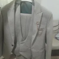 دو عدد کت شلوار کامل بزرگسال و بچگانه