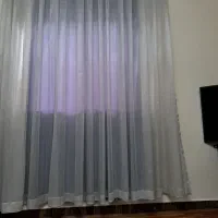 پرده طوسی روشن پانچ
