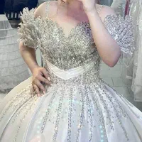 لباس عروس شب نما کریستال‌دوزی دوزی شده