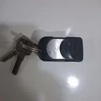 ریموت درب مغازه با دو عدد کلید گم شده