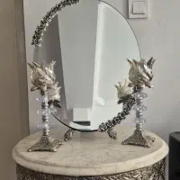 یک عدد آینه و شمعدان به همراه سنگ مرمر