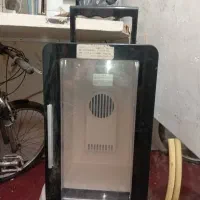 یخچال مسافرتی و ماشین