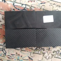 دو عدد هارد یک ۶ ترا یک ۸ ترا مای بوک