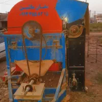 دستگاه خرمنکوب بادام زمینی.