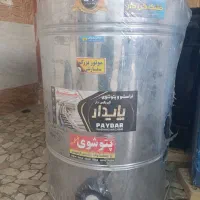 پتو شور و اجاق گاز پنج شعله نواک داخل کارتن