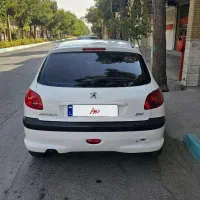 پژو ۲۰۶ تیپ۵ مدل ۱۳۹۷ سفید کاملا سالم