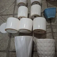 گلدان سنگی بزرگ نو گلدانهای زیاد زیر گلدونی