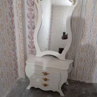 اینه و کنسول شمعدان ندارد