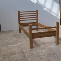 تخت خواب چوبی بزرگ سال کودک و نوزاد گهواره چوبی