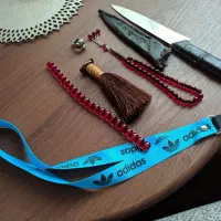 تسبیح و چاقو انگشتر