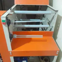 دستگاه رول کن سفره یکبار مصرف