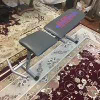 میز بدنسازی و دمبل