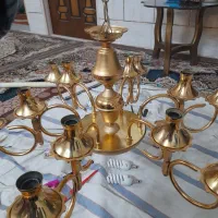 لوستر و آینه و شمعدان