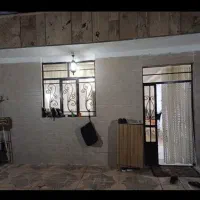 درب دولنگه و پنجره آهنی کارکرده تمیز