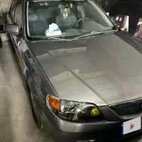 mazda 323 AT