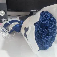 گل روبانی سورمه ای 19 شاخه