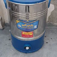 یک عدد ماشین لباس شویی و پتو شور و یک عدد تشک طبی