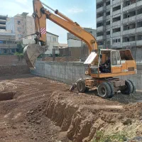 بیل مکانیکی لاستیکی