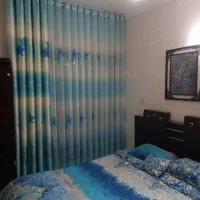 تخت دونفره با کفی و دو عدد پاتختی