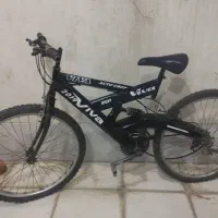 یک دستگاه دوچرخه دنده‌ای فنری کار کرده بدونه مشکل