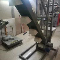 بالا بر دستگاه بسته بندی