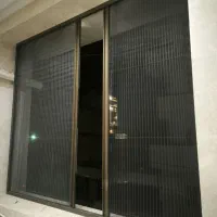 توری پلیسه و پنجره دوجداره