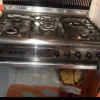اجاق گاز فردار تمام استیل سینجر درحد نو