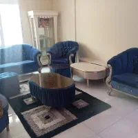 مبل و میز غذاخوری و آکواریوم و میز تلویزیون