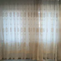 پرده توری طرحدار پذیرایی