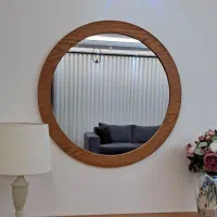 آینه گرد دور چوب