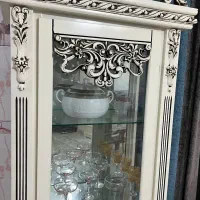 بوفه آینه دار و ساعت ایستاده ومیز تلویزیون