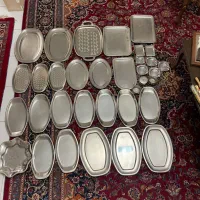 ظروف استیل شامل دیس،زیرسماوری،زیرسیگاری،قندان