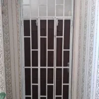 درب ورودی چوبی به همراه آکاردونی
