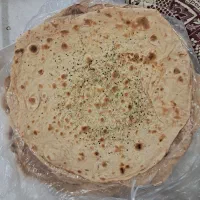 پخت و پخش نان خانگی با آرد بومی و بسته بندی