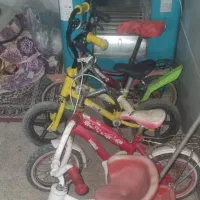 دوتادوچرخه ویکی سه چرخه یکیش فروخته شود زرشکی