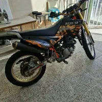 تریل بهپر|موتورسیکلت|قائن, |دیوار