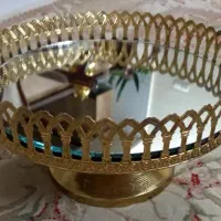 شکلات خوری و شمعدانی و سینی نقره و کفگیر