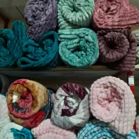 پتو های مسافرتی و حوله های تن پوش خارجی