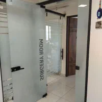 کرکره برقی و درب شیشه ای