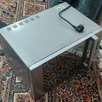 مایکروویو SUNIYA گریل‌دار مدل SU-3530T سالم و تمیز